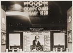 Sign for the 1936 Olympics in a window in England.