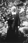 Portrait of a nun standing outside the convent school near Budapest where Dorottya Dezsoefi, and her twin sister, Ida Marianne, were hidden for two years.