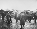German police round-up Jews and load them onto trucks in the Ciechanow ghetto.