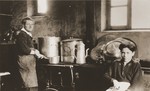 Heinz Stephan Lewy works in the kitchen of the Château de Chabannes OSE (Oeuvre de secours aux Enfants) children's home.