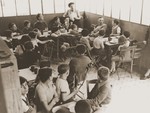 Jewish refugee children attend a discussion session led by Andree Salomon at an OSE (Oeuvre de secours aux Enfants) children's home.