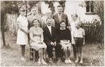 Group portrait of members of the Lacny family who hid Sala Schoen during the German occupation of Poland.