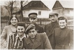 Group portrait of young Jewish men and women in the Wisnicz Nowy ghetto.
