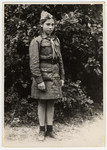 Close-up portrait of a Jewish orphan in a Communist scout uniform in a children's home in Bielsko Biala.