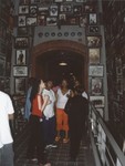 A group of students views the Tower of Faces (Yaffa Eliach Shtetl Collection) in the permanent exhibition of the U.S.