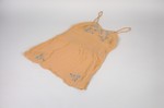 An embrodiered silk chemise belonging to Anna Ilona Gondos, that was taken with her when she left Budapest on the Kasztner rescue train.