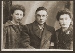 Portrait of three youths in the Dabrowa ghetto.

Pictured from left to right are Bronka Rubinsztajn, Eljezer Geler and Shewa Szeps.