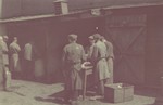 Jewish men work in the meat distribution center in the Lodz ghetto.