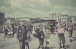 Residents bring their goods to an open-air market in the Lodz ghetto.