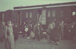Jews board a passenger train during a deportation action in the Lodz ghetto.
