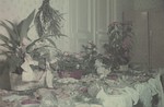 A table decorated with plants and food for a celebration of the birthday of Hans Biebow, the German head of the Lodz ghetto administration.