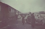 View at the railroad siding in the Lodz ghetto where Jews prepare to board a passenger train during a deportation action from the ghetto.