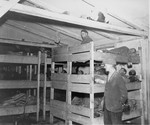 Prisoners in a barracks at liberation.