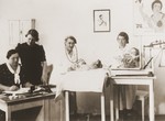 Infants are weighed and examined at the OSE clinic in Cernauti, Romania.