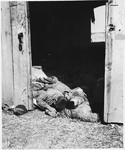 A pile of charred corpses lie near the southeast door of the barn outside of Gardelegen where over 1,000 prisoners were burned alive.