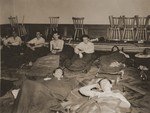 American POWs who survived a death march from the Berga concentration camp, recuperate at a U.S.