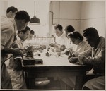 Jewish DPs prepare dental molds in a dentistry vocational training class in Sankt Marien.