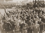 American POWs greet soldiers from the 45th Infantry Division during the liberation of the Fischbach POW camp.