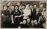 Joli Josef from Romania and Gerhard Cohn from Germany pose with their wedding guests in the Bergen-Belsen displaced persons camp.