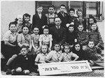 Group portrait of students in the Tarbut school in the Foehrenwald displaced persons camp.