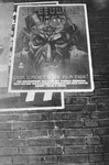 A poster advertising the anti-Semitic propaganda film "Der ewige Jude" (the Eternal Jew) hangs on the side of a Dutch building.