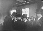 The bridegroom Herman de Leeuw is given a sip of wine during his wedding ceremony at the Sephardic synagogue in the Jewish quarter of Amsterdam.