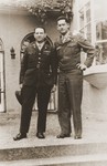 Chaplains Emanuel Rackman and Herbert Friedman pose in front of the United States Forces, European Theater headquarters.