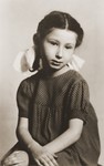 Portrait of Zofja Fajnsztejn, a Jewish child in hiding in Warsaw.