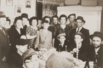 Motel (Mordechai) Appelbaum celebrates his Bar Mitzvah with family and friends in the Gabersee displaced persons camp.
