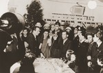 U.S. Army chaplain Herbert Friedman is filmed while conducting a Passover seder for Allied Jewish soldiers and displaced persons at the Schoeneberger Rathaus in Berlin.