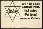 Nazi propaganda poster with a picture of a Jewish star and a German caption that reads, "Whoever wears this symbol is an enemy of our Volk."