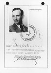 Inside page of a membership card in the Jewish Community of Fuerth belonging to Henryk Lanceter that includes his photograph, the stamp of the community.