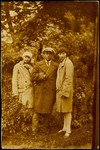 A young Jewish man poses with his girlfriend and her sister during a business trip to Lida.