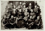 Group portrait of members of the Eisiskes fire department orchestra, which included both Poles and Jews.