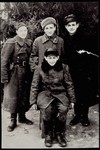 Yitzhak Sonenson (front) with three other Jewish partisans with whom he lived in fall 1944.