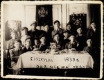 Group portrait of Jewish children attending the Bar Mitzvah party of Avremele Botwinik in Eisiskes.