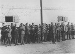 Members of the camp orchestra perform in front of a barracks in the Janowska concentration camp.