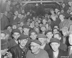 Newly liberated inmates crowd into a barracks in Buchenwald.