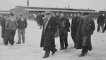 Survivors walk though the Buchenwald concentration camp after liberation.