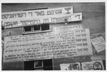 Zionist election banners are posted on the exterior of a barracks in the Bergen Belsen displaced persons camp.