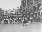 A troupe of dancers from Bulgaria entertain German spectators upon the arrival of the Bulgarian Olympic team in Germany.