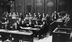 Defendant Ernst Biberstein pleads not guilty during his arraignment at the Einsatzgruppen Trial.