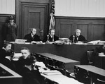 The judges of Military Tribunal II-A, hearing the Einsatzgruppen Trial, in a smaller courtroom in the Palace of Justice.