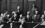 Defendant Waldemar von Radetzky pleads not guilty during his arraignment at the Einsatzgruppen Trial.