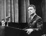 Brigadier General Telford Taylor, the Chief of Counsel for the prosecution, addresses the court at a session of the Medical Case (Doctors') Trial in Nuremberg.