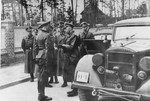 Reichsfuehrer-SS Heinrich Himmler greets SS Sturmbannfuehrer and camp commandant Max Pauly during an official visit to Stutthof.