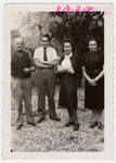 Group portrait of Jewish refugess in France.

Pictured are Robert and Peter Tritsch, and Margit and Lilly Morawetz.