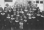School picture of the students in the Couvent du Bon Pasteur, among them Ruth Bild, alias Monique Lannoy, a Jewish child in hiding.