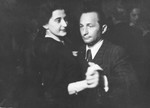 Close-up portrait of Lusia and Henryk Eichenholz dancing together.