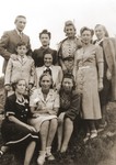 Felicja Berland poses with a group of Jewish DPs living in Sweden.